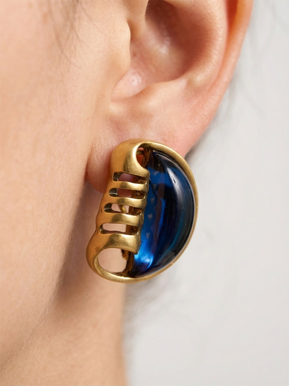Gold-Tone Earrings with Deep Blue Glass Accent